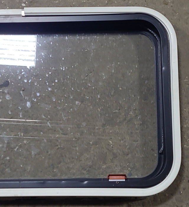Used Black Radius Emergency Opening Window : 30 3/4" W x 18 3/4" H x 1 5/8" D