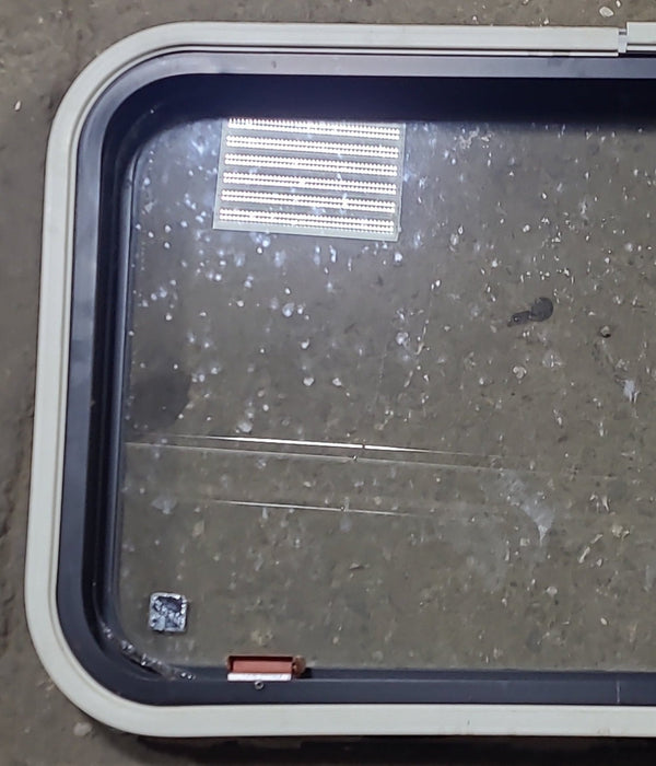Used Black Radius Emergency Opening Window : 30 3/4" W x 18 3/4" H x 1 5/8" D