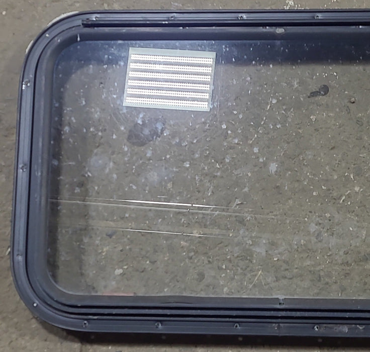 Used Black Radius Emergency Opening Window : 30 3/4" W x 18 3/4" H x 1 5/8" D