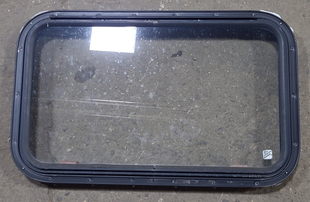 Used Black Radius Emergency Opening Window : 30 3/4" W x 18 3/4" H x 1 5/8" D