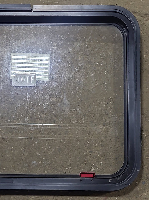 Used Black Radius Emergency Opening Window : 30 3/4" W x 23 3/4" H x 1 5/8" D