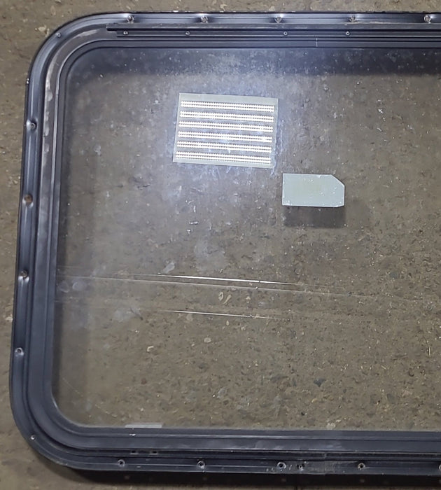 Used Black Radius Emergency Opening Window : 30 3/4" W x 23 3/4" H x 1 5/8" D