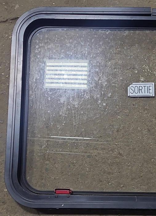 Used Black Radius Emergency Opening Window : 30 3/4" W x 23 3/4" H x 1 5/8" D