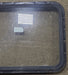 Used Black Radius Emergency Opening Window : 30 3/4" W x 23 3/4" H x 1 5/8" D - Young Farts RV Parts