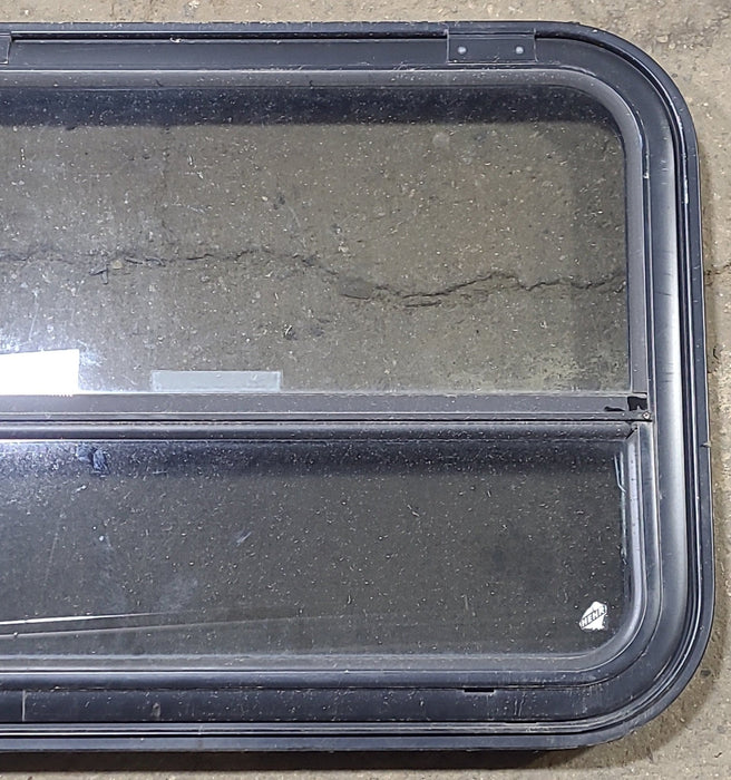 Used Black Radius Emergency Opening Window : 31 1/2" W x 23 3/4" H x 1 7/8" D - Young Farts RV Parts