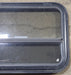 Used Black Radius Emergency Opening Window : 31 1/2" W x 23 3/4" H x 1 7/8" D - Young Farts RV Parts