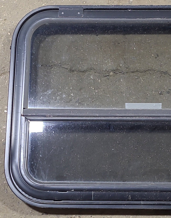 Used Black Radius Emergency Opening Window : 31 1/2" W x 23 3/4" H x 1 7/8" D - Young Farts RV Parts