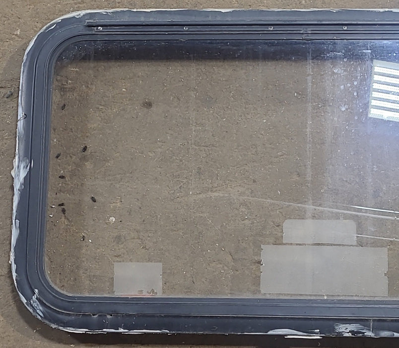 Used Black Radius Emergency Opening Window : 35 1/2" W x 18 1/2" H x 1 7/8" D
