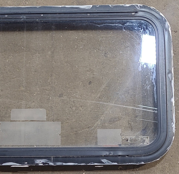 Used Black Radius Emergency Opening Window : 35 1/2" W x 18 1/2" H x 1 7/8" D