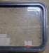 Used Black Radius Emergency Opening Window : 35 1/2" W x 18 1/2" H x 1 7/8" D - Young Farts RV Parts