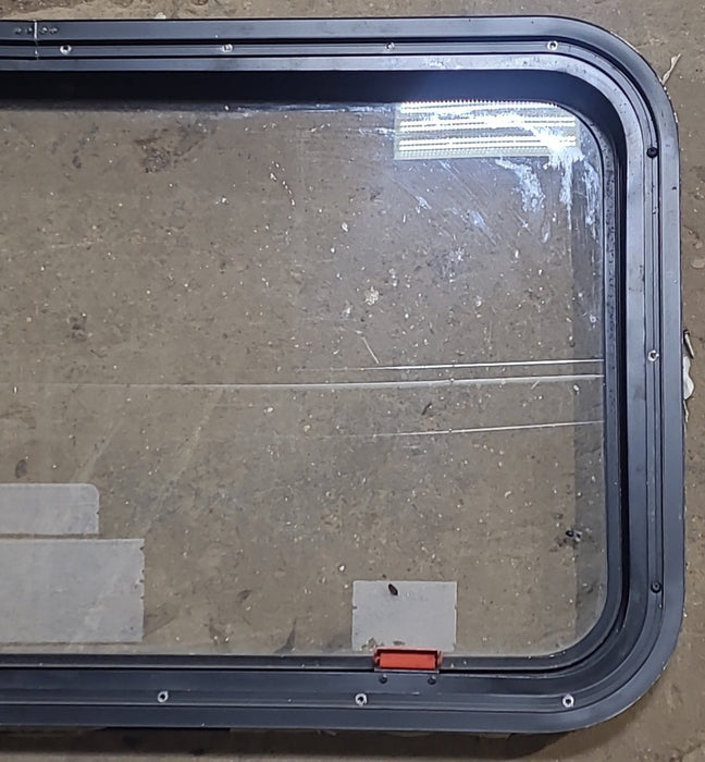 Used Black Radius Emergency Opening Window : 35 1/2" W x 18 1/2" H x 1 7/8" D