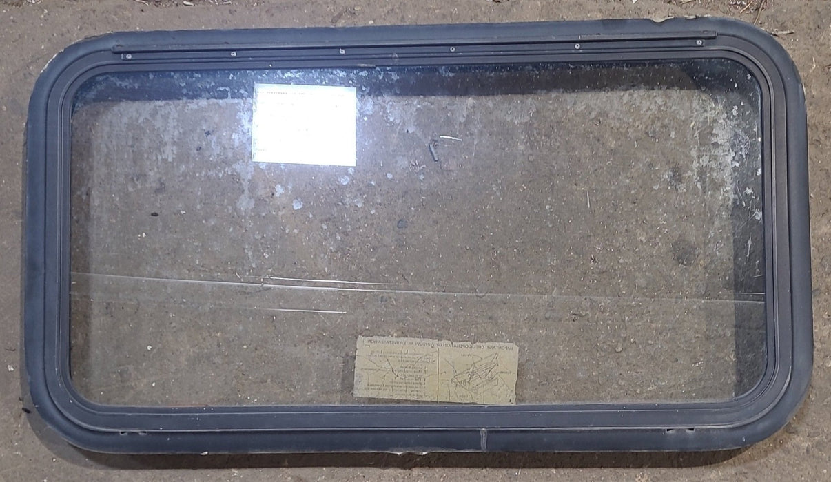 Used Black Radius Emergency Opening Window : 35 1/2" W x 18 3/4" H x 1 3/4" D - Young Farts RV Parts