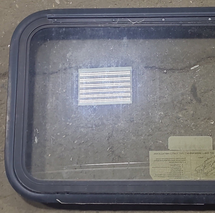 Used Black Radius Emergency Opening Window : 35 1/2" W X 18 3/4" H X 1 3/4" D