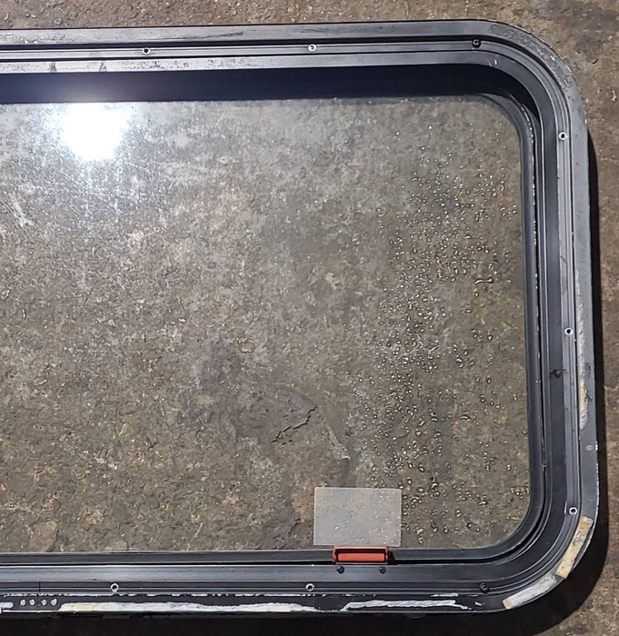 Used Black Radius Emergency Opening Window : 35 1/2" W x 18 3/4" H x 1 3/4" D - Young Farts RV Parts
