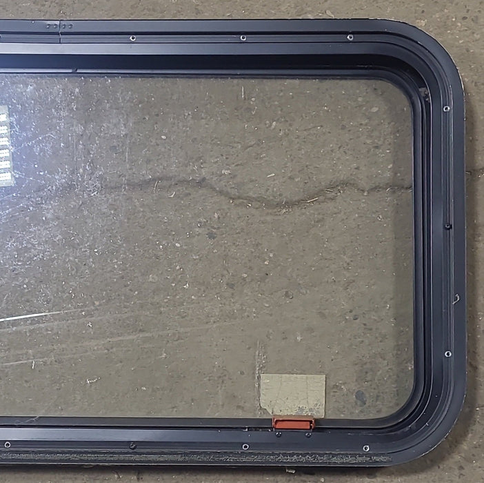 Used Black Radius Emergency Opening Window : 35 1/2" W X 18 3/4" H X 1 3/4" D