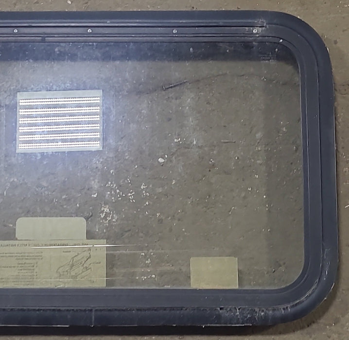 Used Black Radius Emergency Opening Window : 35 1/2" W X 18 3/4" H X 1 3/4" D