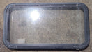 Used Black Radius Emergency Opening Window : 35 1/2" W x 18 3/4" H x 1 3/4" D - Young Farts RV Parts