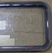 Used Black Radius Emergency Opening Window : 35 1/2" W X 18 3/4" H X 1 3/4" D - Young Farts RV Parts