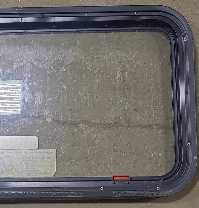 Used Black Radius Emergency Opening Window : 35 1/2" W X 18 3/4" H X 1 3/4" D