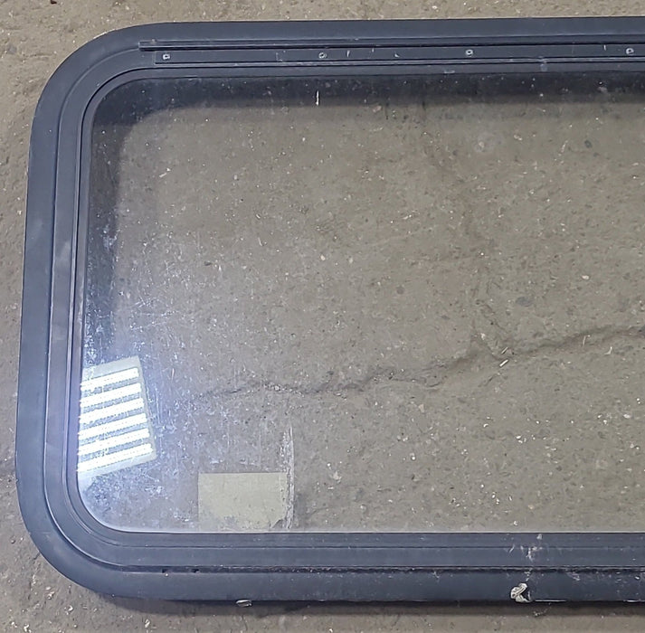 Used Black Radius Emergency Opening Window : 35 1/2" W X 18 3/4" H X 1 3/4" D