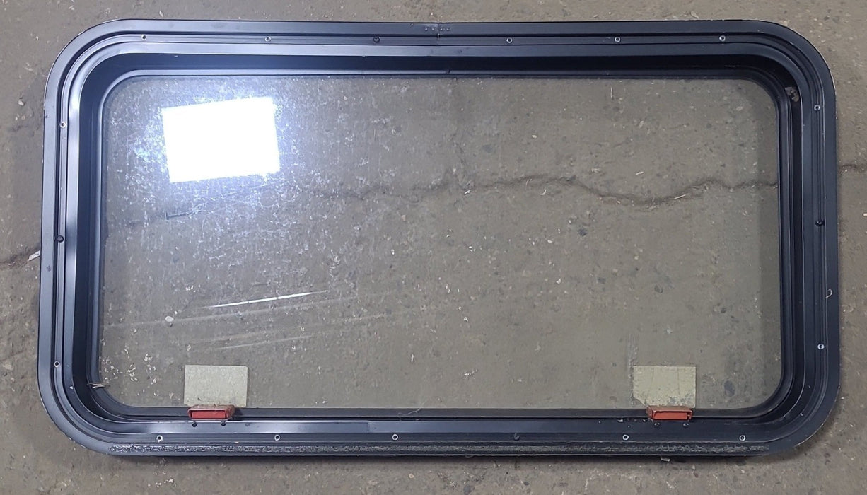 Used Black Radius Emergency Opening Window : 35 1/2" W X 18 3/4" H X 1 3/4" D