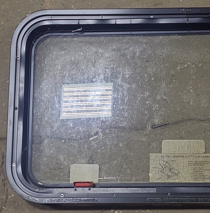 Used Black Radius Emergency Opening Window : 35 1/2" W X 18 3/4" H X 1 3/4" D