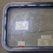 Used Black Radius Emergency Opening Window : 35 1/2" W X 18 3/4" H X 1 3/4" D - Young Farts RV Parts