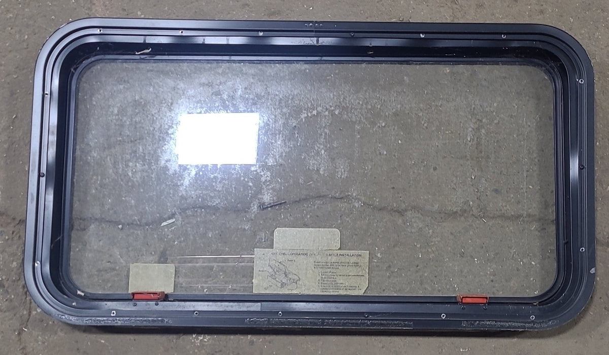 Used Black Radius Emergency Opening Window : 35 1/2" W X 18 3/4" H X 1 3/4" D