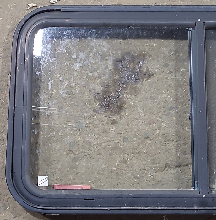 Used Black Radius Emergency Opening Window : 35 1/2" W x 19 1/2" H x 1 1/8" D