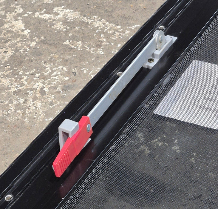 Used Black Radius Emergency Opening Window : 35 1/4" W x 21 1/2" H x 1 3/4" D