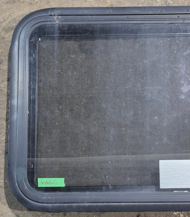 Used Black Radius Emergency Opening Window : 35 1/4" W x 21 1/2" H x 1 3/4" D
