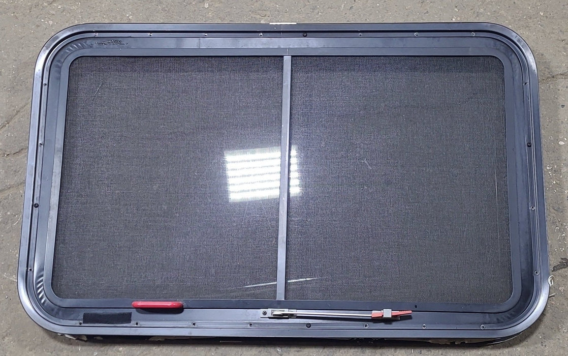Used Black Radius Emergency Opening Window : 35 1/4" W x 21 1/2" H x 1 7/8" D - Young Farts RV Parts