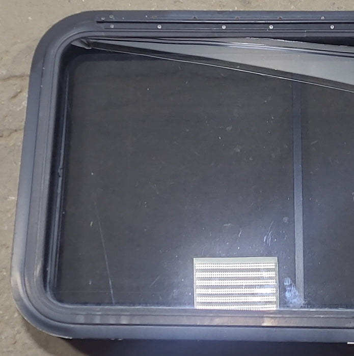Used Black Radius Emergency Opening Window : 35 1/4" W x 21 1/2" H x 1 7/8" D - Young Farts RV Parts