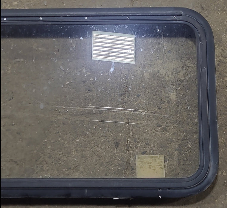 Used Black Radius Emergency Opening Window : 35 1/4" W x 21 1/2" H x 1 7/8" D