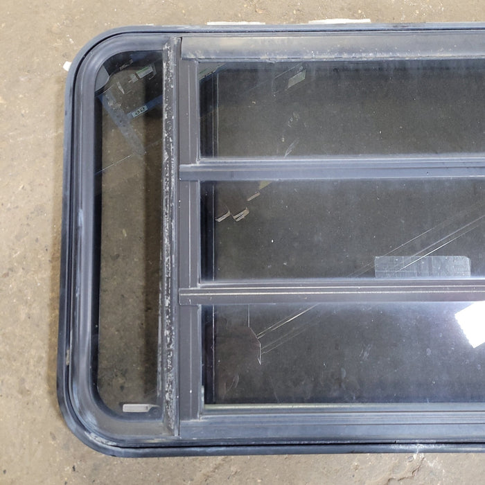 Used Black Radius Emergency Opening Window : 35 1/4" W X 21 1/2" H X 1 7/8" D
