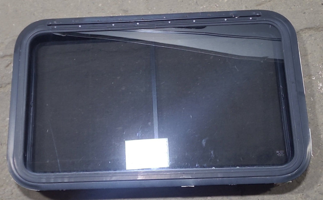 Used Black Radius Emergency Opening Window : 35 1/4" W x 21 1/2" H x 1 7/8" D - Young Farts RV Parts