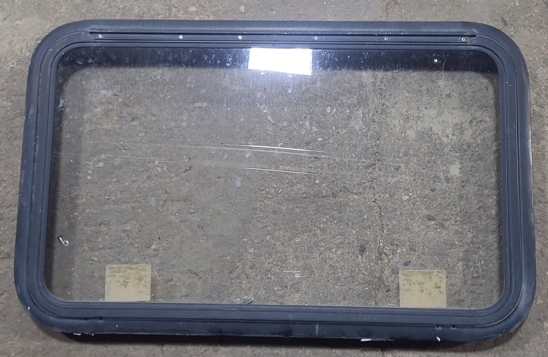 Used Black Radius Emergency Opening Window : 35 1/4" W x 21 1/2" H x 1 7/8" D - Young Farts RV Parts