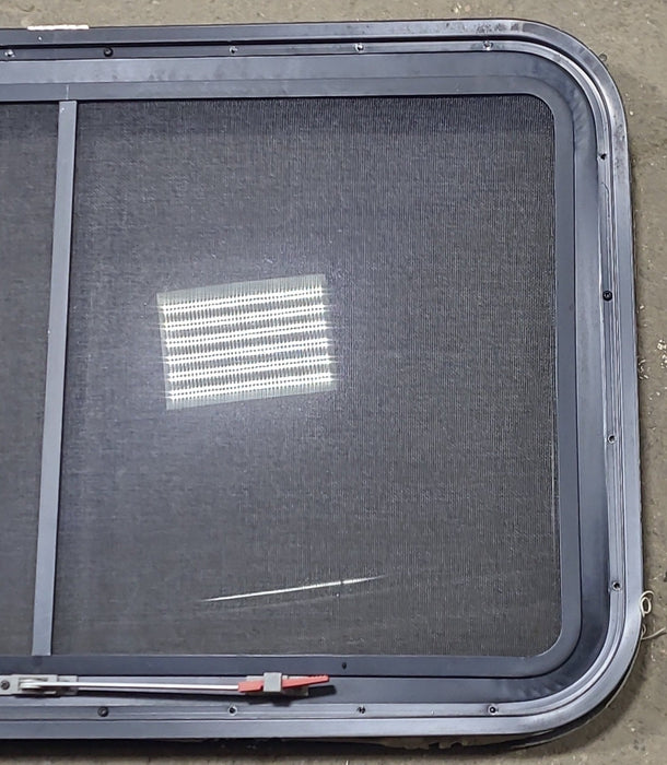 Used Black Radius Emergency Opening Window : 35 1/4" W x 21 1/2" H x 1 7/8" D - Young Farts RV Parts