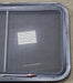 Used Black Radius Emergency Opening Window : 35 1/4" W x 21 1/2" H x 1 7/8" D - Young Farts RV Parts