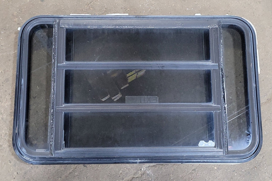Used Black Radius Emergency Opening Window : 35 1/4" W X 21 1/2" H X 1 7/8" D