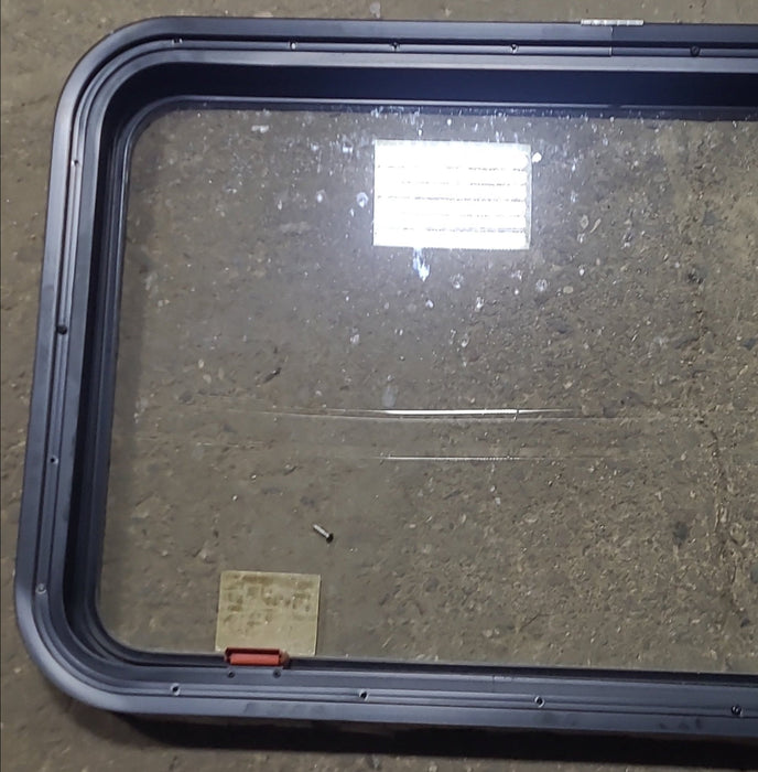Used Black Radius Emergency Opening Window : 35 1/4" W x 21 1/2" H x 1 7/8" D