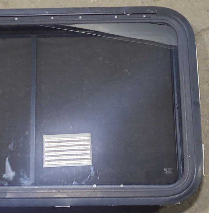 Used Black Radius Emergency Opening Window : 35 1/4" W x 21 1/2" H x 1 7/8" D - Young Farts RV Parts
