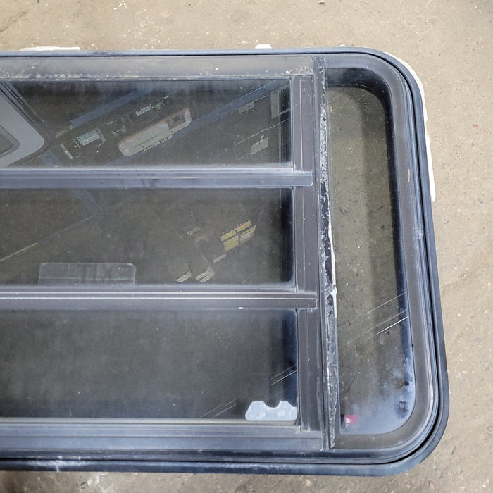 Used Black Radius Emergency Opening Window : 35 1/4" W X 21 1/2" H X 1 7/8" D