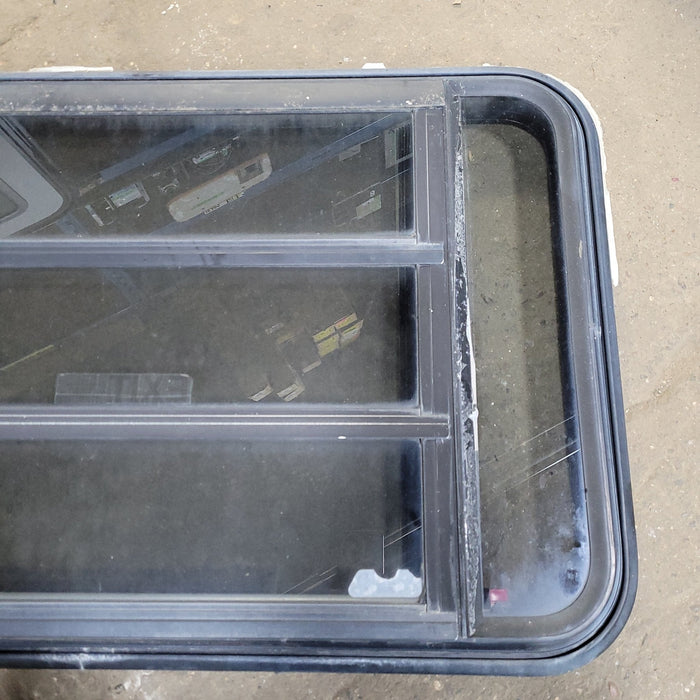 Used Black Radius Emergency Opening Window : 35 1/4" W X 21 1/2" H X 1 7/8" D - Young Farts RV Parts