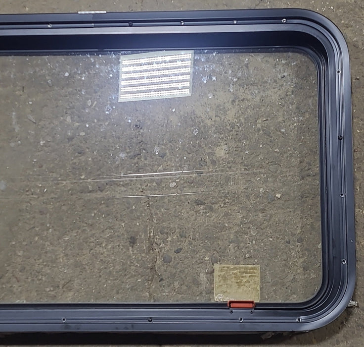 Used Black Radius Emergency Opening Window : 35 1/4" W x 21 1/2" H x 1 7/8" D