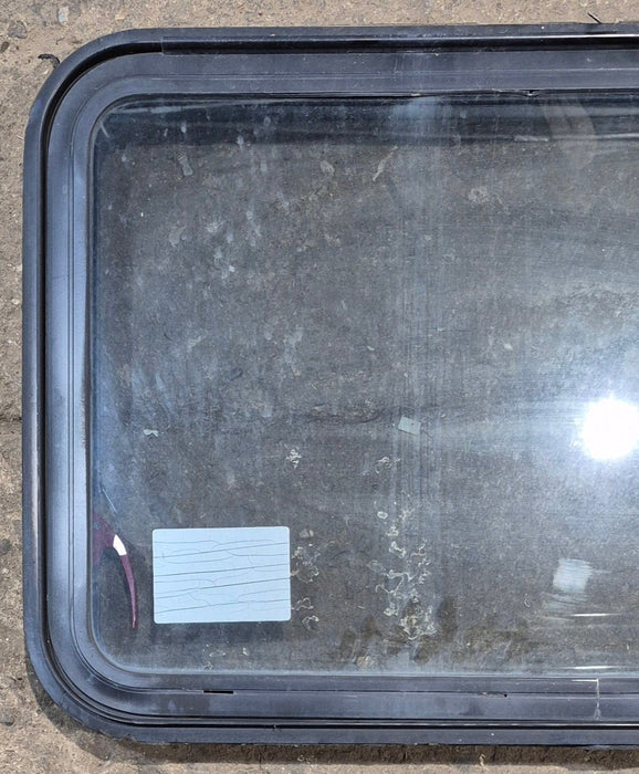 Used Black Radius Emergency Opening Window : 35 1/4" W x 21 1/4" H x 1 3/4" D