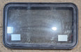 Used Black Radius Emergency Opening Window : 35 1/4" W x 21 1/4" H x 1 3/4" D - Young Farts RV Parts