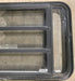 Used Black Radius Emergency Opening Window : 35 1/4" W x 21 1/4" H x 1 7/8" D - Young Farts RV Parts