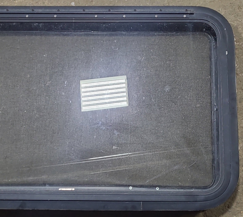 Used Black Radius Emergency Opening Window : 35 3/8" W x 21 3/8" H x 1 5/8" D