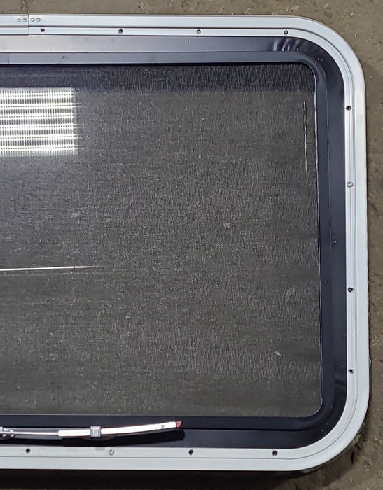 Used Black Radius Emergency Opening Window : 35 3/8" W x 21 3/8" H x 1 5/8" D